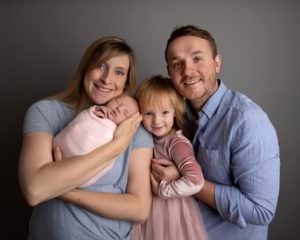 Family images including sibling and baby. Part of a gallery from newborn photography shoot in Glasgow